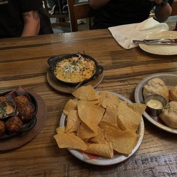 The Eagle Mass Ave - Hush puppies, spicy chicken dip, biscuits - American Near Me - Indianapolis, Indiana