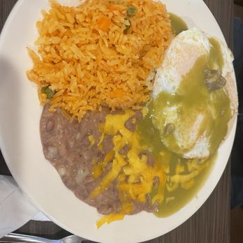 Cheliz - Huevos and enchilada with green chile. Beans and rice. Yummy. - Diners Near Me - Redlands, California