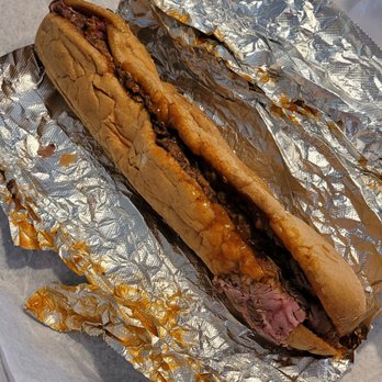 Giovanni's Roast Beef and Pizza - a sandwich wrapped in foil - Pizza Near Me - Salem, New Hampshire Giovanni's Roast Beef and Pizza - a sandwich wrapped in foil - Pizza Near Me - Salem, New Hampshire