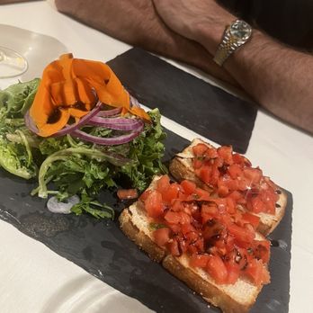 Rome's Flavours - Tomato Bruschetta - Desserts Near Me - Winter Park, Florida Rome's Flavours - Tomato Bruschetta - Desserts Near Me - Winter Park, Florida