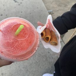 Cherry coke slurpee and some steak and taco taquitos Cherry coke slurpee and some steak and taco taquitos