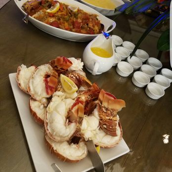 Shelly's  Cakes and Catering - A beautiful tropical buffet style for our guest. - Caterers Near Me