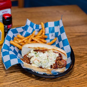 Gators Den Sports Grill - a hot dog and french fries - American Near Me - Gainesville, Florida Gators Den Sports Grill - a hot dog and french fries - American Near Me - Gainesville, Florida
