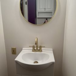 J&G Contractors - Bathroom sink cabinet and fixtures and wall painted