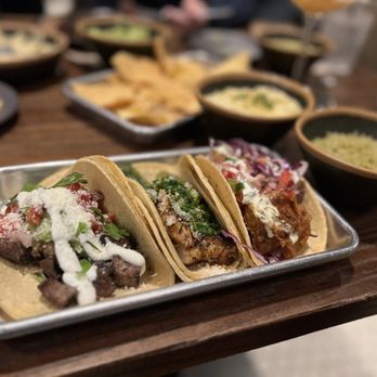 The Local - a tray of tacos and chips - Mexican Near Me - Abilene, Texas The Local - a tray of tacos and chips - Mexican Near Me - Abilene, Texas