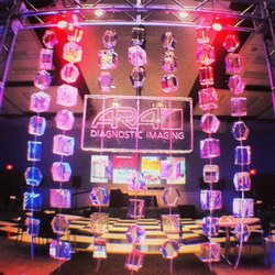 Full Spectrum Ice Sculptures - Custom hanging ice display with logo