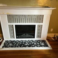 Renaissance Repair Services - Refaced fireplace and new tile hearth - before paint
