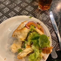 Excess bun and salad. Excess bun and salad.