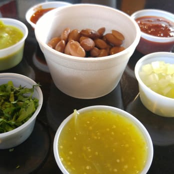 El Coyote Charro - Beans, condiments, and a few different salsas from their salsa bar. - Mexican Near Me - St. George, Utah El Coyote Charro - Beans, condiments, and a few different salsas from their salsa bar. - Mexican Near Me - St. George, Utah