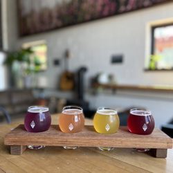 Root Wild - Kombucha Flight of 4 (~$12): blueberry, pineapple, grapefruit, and Purple Wave