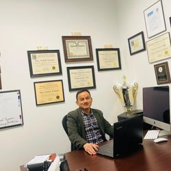 Advanced Transformational Hypnosis And Coaching ATHAC - Certified Consulting Hypnotist and Life Coach, Rai, A.K. in his office, Advanced Transformational Hypnosis and Coaching ATHAC, inc.