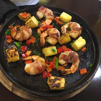 Lone Wolf Restaurant & Lounge - Bacon wrapped scallops with green onion, red bell peppers and pineapple. - New American Near Me - Jackson, California Lone Wolf Restaurant & Lounge - Bacon wrapped scallops with green onion, red bell peppers and pineapple. - New American Near Me - Jackson, California