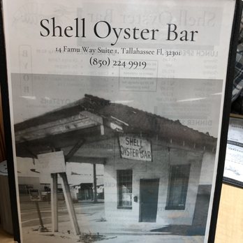 Shell Oyster Bar - The other side of the menu with a photo of the tiny original sit on a stool at the counter oyster bar. - Seafood Near Me - Tallahassee, Florida