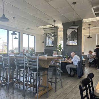 Meles Diner - people sitting at tables in a restaurant - Diners Near Me - Evansville, Indiana Meles Diner - people sitting at tables in a restaurant - Diners Near Me - Evansville, Indiana