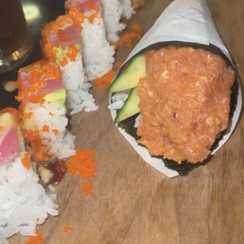 Arigato Sushi - Tuna Trio Roll (L) and Spicy Tuna Hand Roll (R) - Sushi Bars Near Me - Gold River, California Arigato Sushi - Tuna Trio Roll (L) and Spicy Tuna Hand Roll (R) - Sushi Bars Near Me - Gold River, California