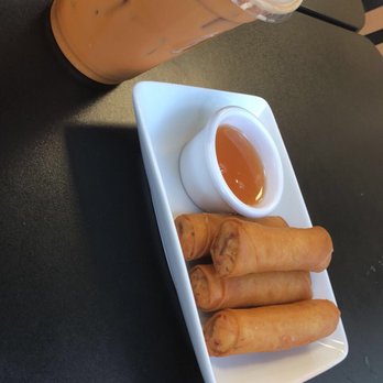 Thai Taste - a plate of food and a drink - Thai Near Me - Springdale, Arkansas Thai Taste - a plate of food and a drink - Thai Near Me - Springdale, Arkansas