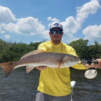 Chum Crazy Charters - Nick from Canada with his personal best redfish. - Boat Charters Near Me Chum Crazy Charters - Nick from Canada with his personal best redfish. - Boat Charters Near Me