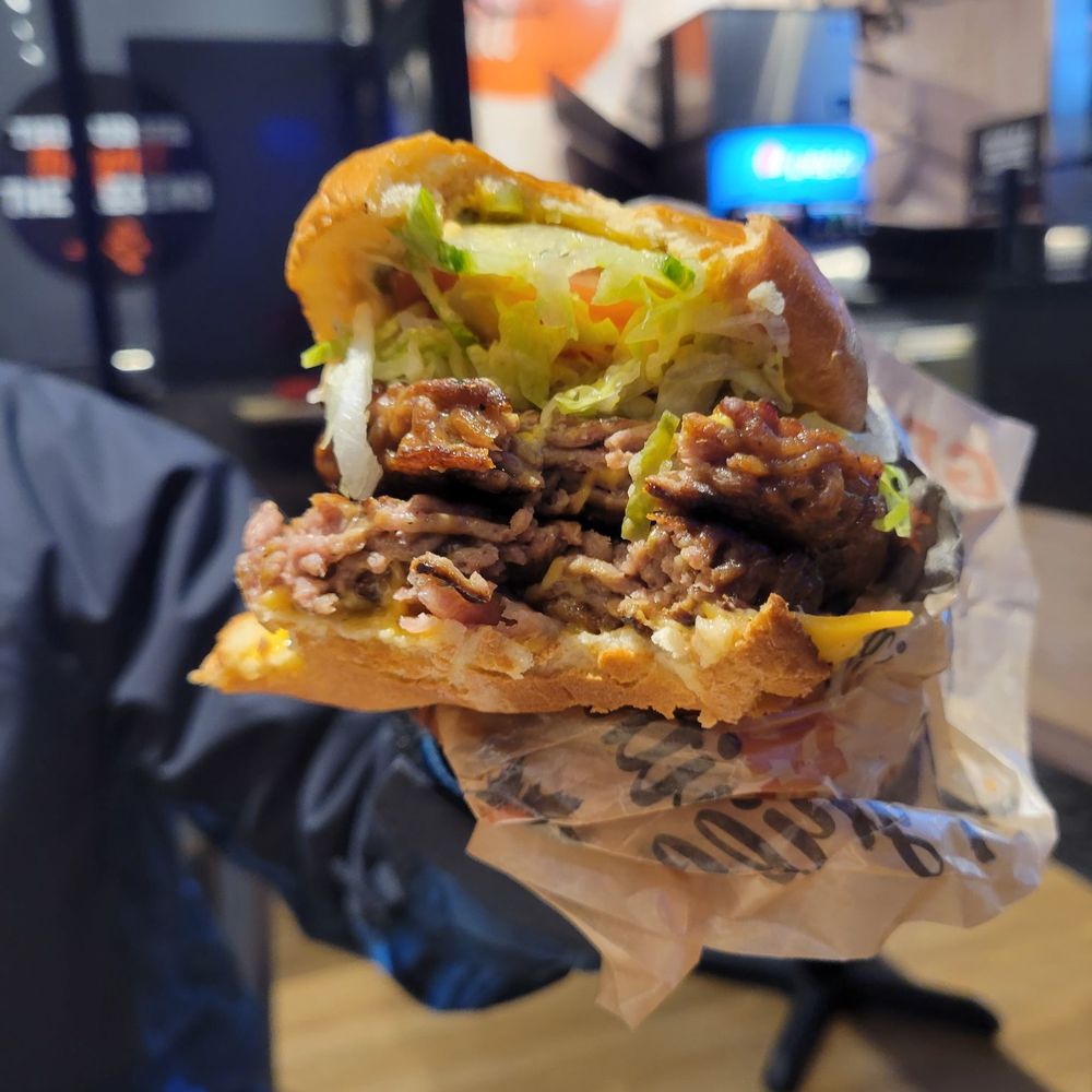 Harvey's - a sandwich with meat and lettuce - Fast Food Near Me - Barrie, Ontario