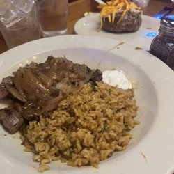 Texas Roadhouse - Beef tips n rice with a baked potato