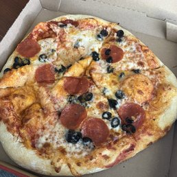 Pepperoni and black olive thick crust pizza Pepperoni and black olive thick crust pizza