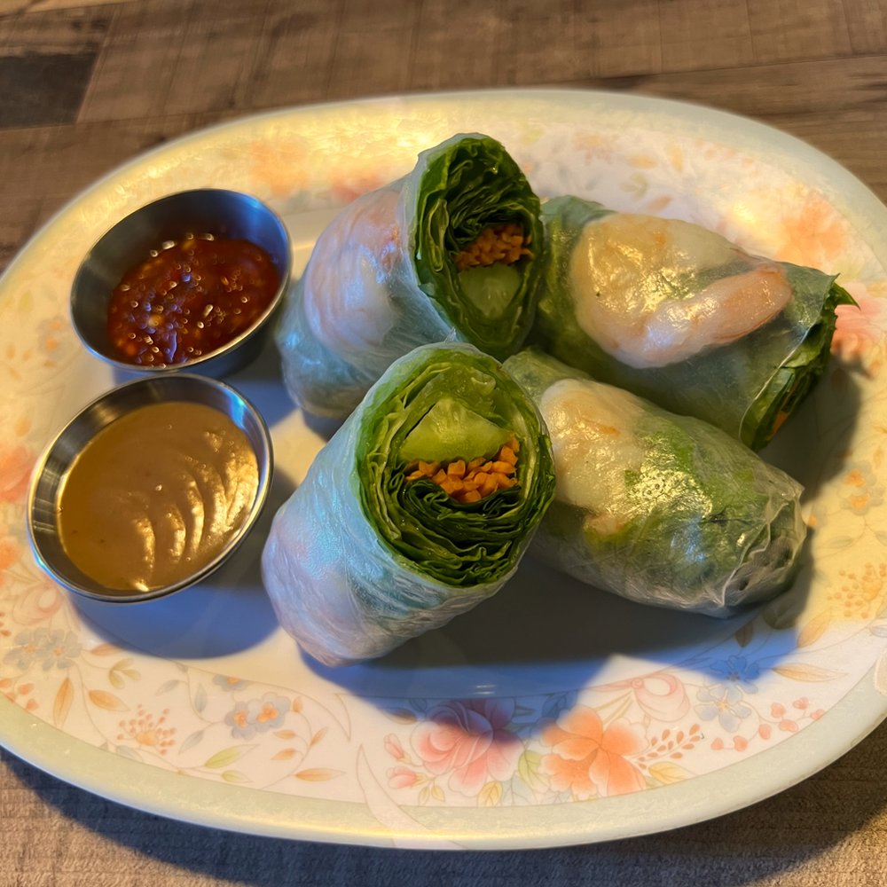 Shrimp spring rolls that were almost all lettuce herbs and carrot Shrimp spring rolls that were almost all lettuce herbs and carrot