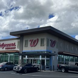 the front of a walgreens convenience store