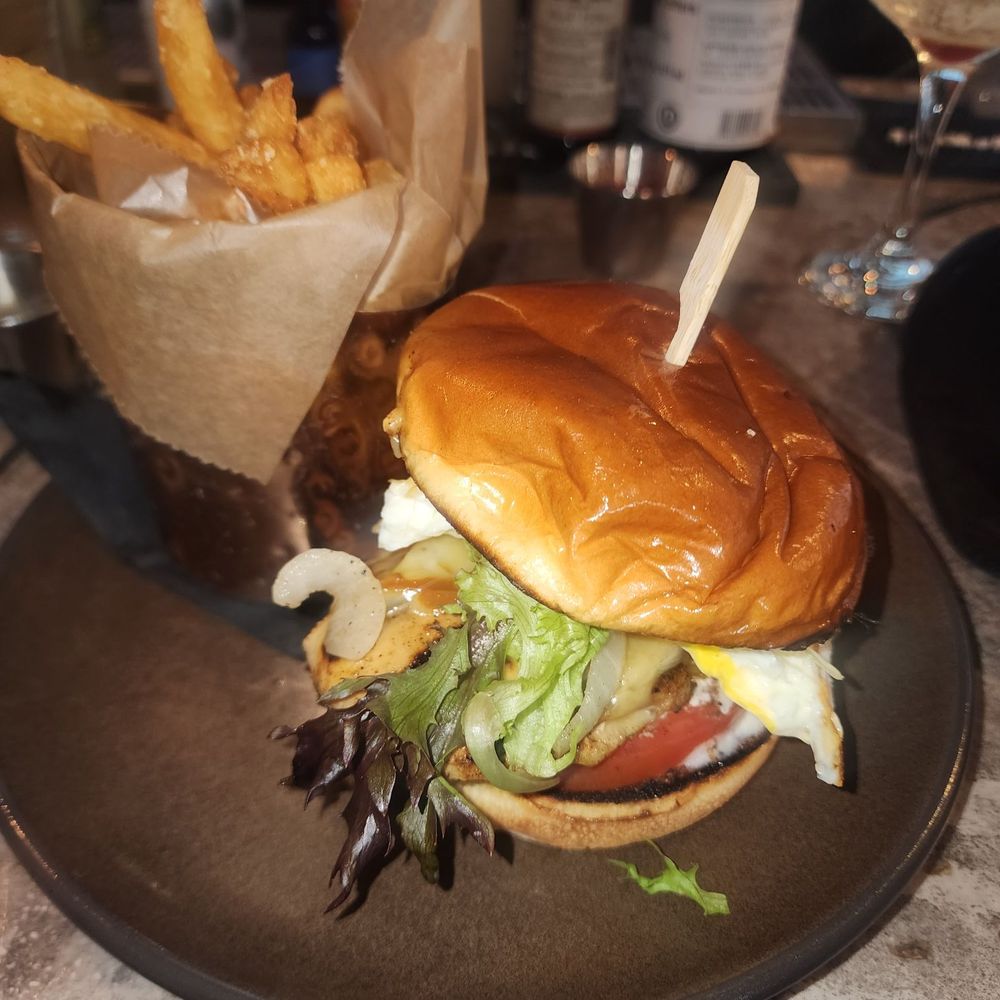 The Stubborn Mule - Chicken Sandwhich with parmesan fries - New American Near Me - Orlando, Florida The Stubborn Mule - Chicken Sandwhich with parmesan fries - New American Near Me - Orlando, Florida