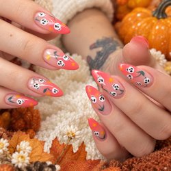 Nail of the Day - Sweet but spooky! Pink ombré nails with adorable skull cherries and tiny stars. Halloween has never looked this cute!