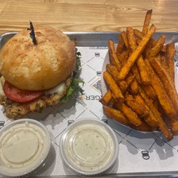 Grilled Chicken Burger, gluten free bun with sweet potato fries.