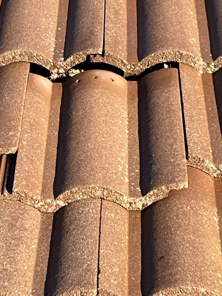 Slide of Milan Roofing