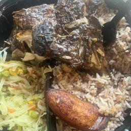 Rice and peas and jerk chicken take out,