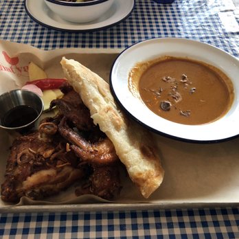 Hat Yai - #1 chicken quarter leg with curry, roti Ana extra wings. - Thai Near Me - Portland, Oregon Hat Yai - #1 chicken quarter leg with curry, roti Ana extra wings. - Thai Near Me - Portland, Oregon