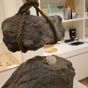 Frye Art Museum - Rock above flower art piece in the gift shop. - Art Museums Near Me - Seattle, Washington Frye Art Museum - Rock above flower art piece in the gift shop. - Art Museums Near Me - Seattle, Washington