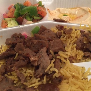 Kismet Cafe - Gyro over rice with sauce on the side. - Halal Near Me - Austin, Texas Kismet Cafe - Gyro over rice with sauce on the side. - Halal Near Me - Austin, Texas