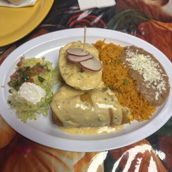 Taqueria La Catrina - Steak chimichanga with rice and refried beans - Mexican Near Me - Baton Rouge, Louisiana Taqueria La Catrina - Steak chimichanga with rice and refried beans - Mexican Near Me - Baton Rouge, Louisiana