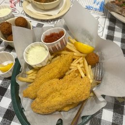 Fried catfish, fries and hushpuppies.