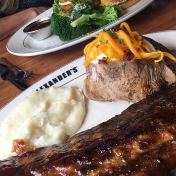 J. Alexander's - Baby back ribs with smashed potatoes and a loaded baked potato. Wow. - New American Near Me - Boca Raton, Florida J. Alexander's - Baby back ribs with smashed potatoes and a loaded baked potato. Wow. - New American Near Me - Boca Raton, Florida