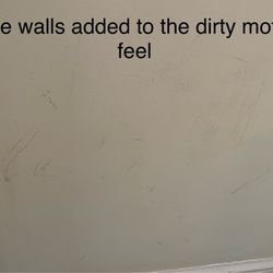 Dirty walls throughout room