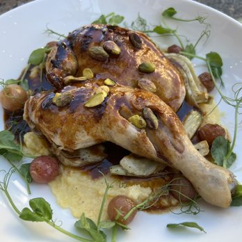 Bar Tulia - Mercato - Roasted Half Chicken Polenta, Roasted Grapes, Fennel, Pistachio & Chicken au Jus - Pizza Near Me - Naples, Florida