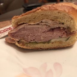 Reheated "The Cuban". Note the thin slices of pork at the top and the rest is ham. Reheated "The Cuban". Note the thin slices of pork at the top and the rest is ham.