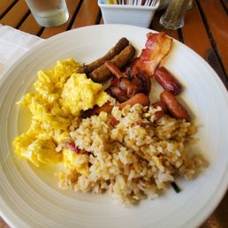 Scrambled eggs, turkey sausage, fried rice, and bacon. Scrambled eggs, turkey sausage, fried rice, and bacon.