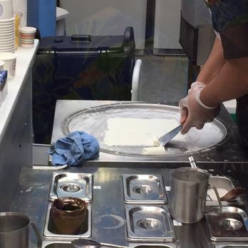 Sweet Creams - The employee has "troweled" the ice cream into a sheet and is rolling it - Ice Cream & Frozen Yogurt Near Me - Honolulu, Hawaii