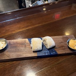 The fresh bread with two different butters, cinnamon and then a garlic butter. The fresh bread with two different butters, cinnamon and then a garlic butter.