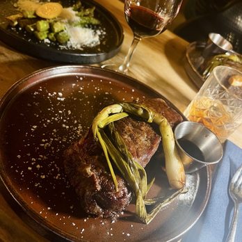 True Blue Butcher and Barrel - 14 oz NY Strip, side asparagus, red wine, & a old fashioned - Burgers Near Me - Wilmington, North Carolina