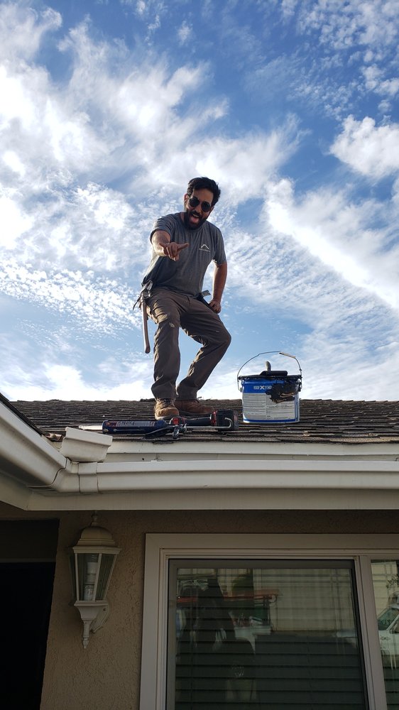 Slide of Rational Roofing Services