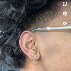 Perfections Barber Shop - Mid taper fade and front taper.