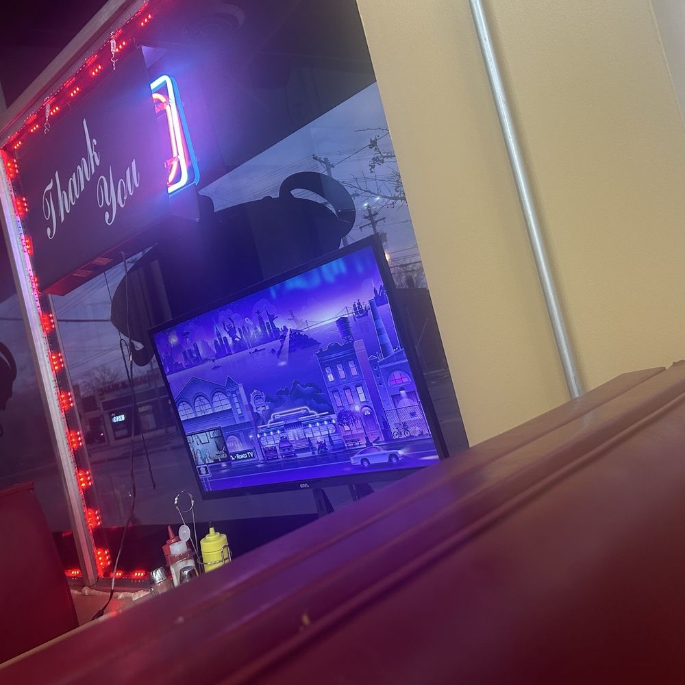 Kyrie’s Kafe - I think it was five booths all equipped tvs - Soul Food Near Me - Cleveland, Ohio