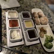 Photo of The Melting Pot - Indianapolis, IN, United States. Dips for the main course and veggies half eaten :)