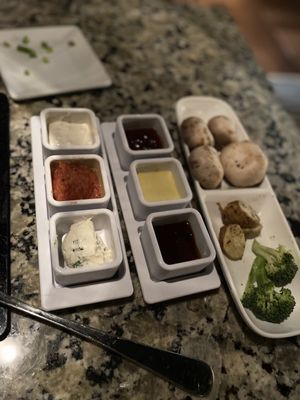 Photo of The Melting Pot - Indianapolis, IN, US. Dips for the main course and veggies half eaten :)