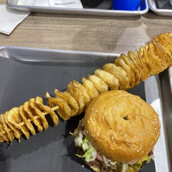 Burger Factory - a large sandwich and fries on a tray - Burgers Near Me - Mississauga, Ontario Burger Factory - a large sandwich and fries on a tray - Burgers Near Me - Mississauga, Ontario